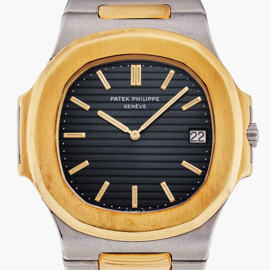 View full screen - View 1 of Lot 146. Reference 3700/1 Nautilus ‘Jumbo’ | A yellow gold and stainless steel automatic wristwatch with date and bracelet, Made in 1979.