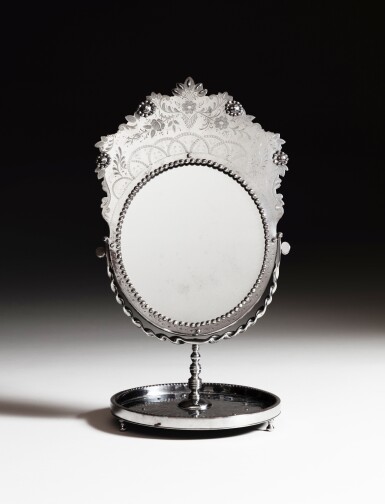 View full screen - View 1 of Lot 168. A Russian engraved steel and faceted steel studs mirror, attributed to the manufactory of Tula, early 19th century.