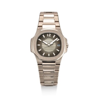 View full screen - View 1 of Lot 601. PATEK PHILIPPE | NAUTILUS, REFERENCE 7011, A WHITE GOLD BRACELET WATCH WITH DATE, CIRCA 2008.