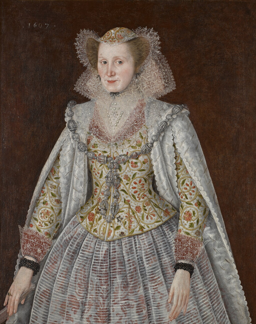View full screen - View 1 of Lot 330. Portrait of a lady, three-quarter length, wearing an embroidered waistcoat, with lace collar and cuffs.