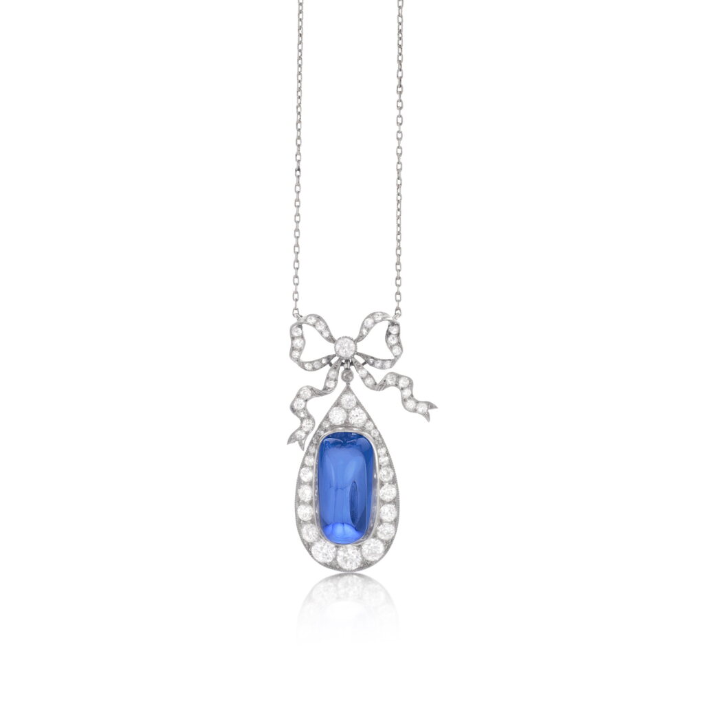 View full screen - View 1 of Lot 1062. Sapphire and diamond pendent necklace, circa 1910.