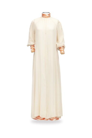 View full screen - View 1 of Lot 59. Capucci, Haute Couture, circa 1970, Long crepe jumpsuit and muslin overdress | Combinaison pantalon en crêpe et sur-robe en mousseline.