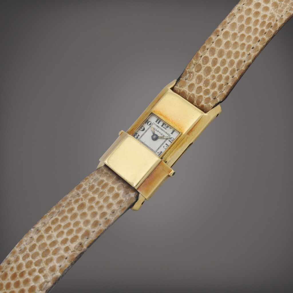 View full screen - View 1 of Lot 10. A yellow gold wristwatch with concealed dial | Made in 1932.
