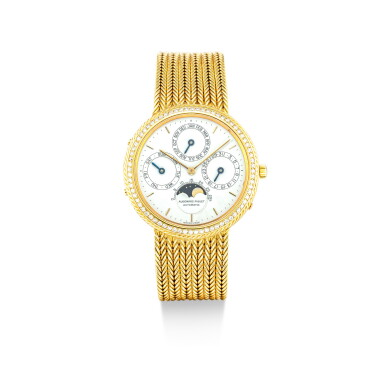 View full screen - View 1 of Lot 859. AUDEMARS PIGUET | A YELLOW GOLD AND DIAMOND-SET PERPETUAL CALENDAR BRACELET WATCH WITH MOON PHASES, CIRCA 1990.