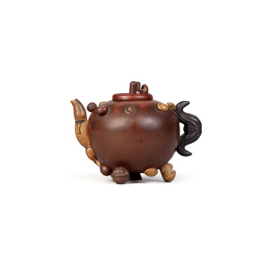 View full screen - View 1 of Lot 435. A Yixing 'hundred-pot' teapot and cover, Qing dynasty, 18th / 19th century | 清十八 / 十九世紀 宜興百果茶壺《聘泉》款.