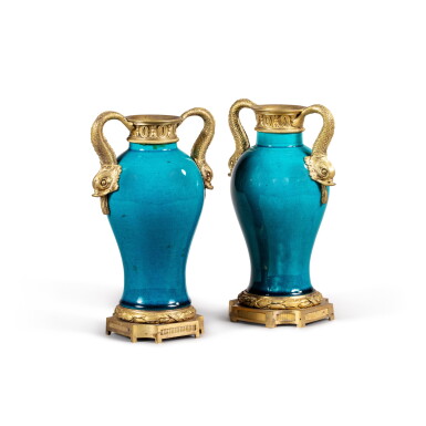 View full screen - View 1 of Lot 165. A pair of gilt-bronze, mounted blue enameled porcelain vases, China, 18th century and Louis XVI style, 19th century | Paire de vases en porcelaine émaillée bleu turquoise, Chine XVIIIe et monture de bronze doré de style Louis XVI, XIXe siècle.