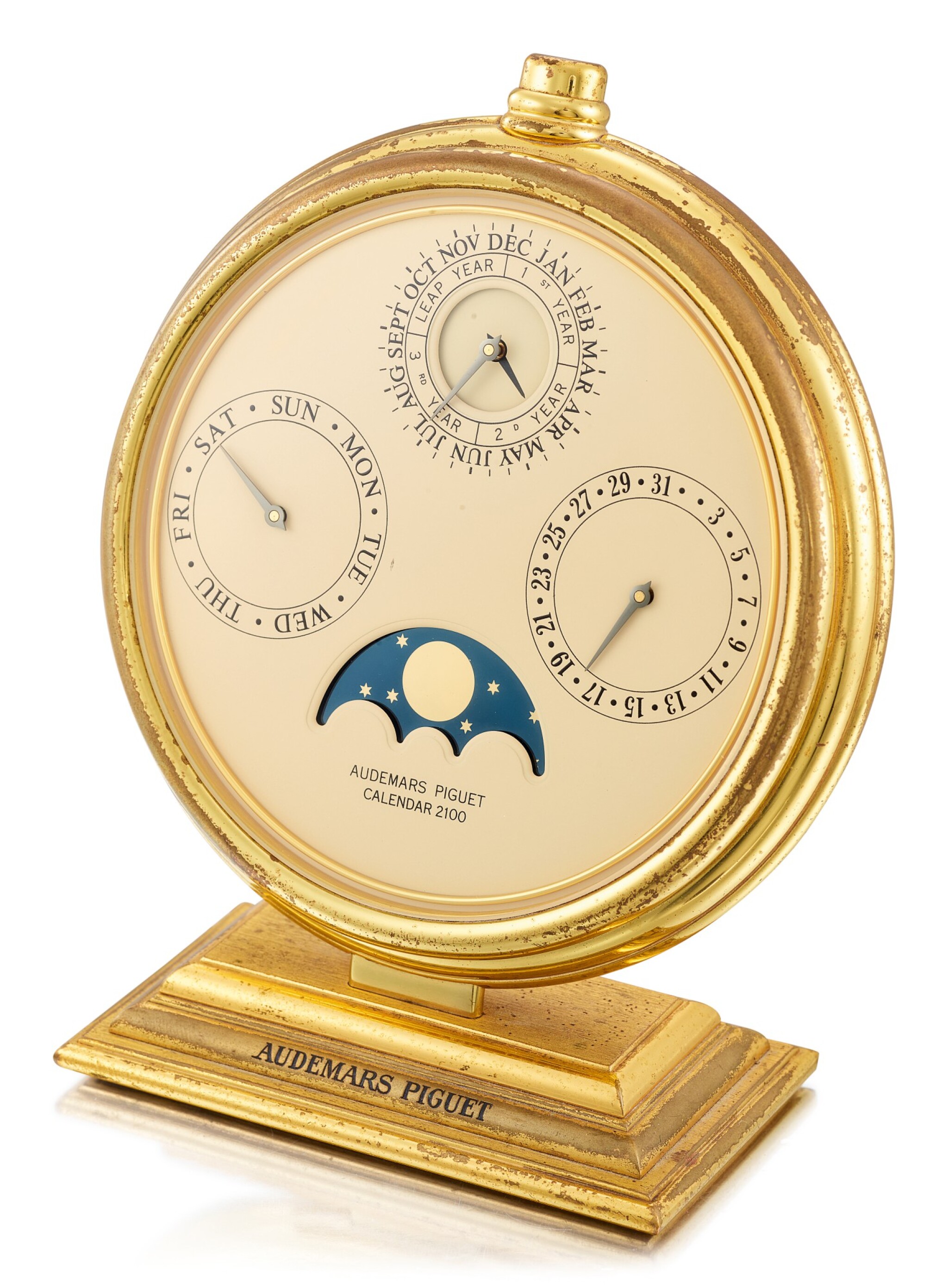 AUDEMARS PIGUET CALENDAR 2100 A GILT BRASS DESK PERPETUAL CALENDAR