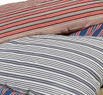 SIX VINTAGE SWEDISH STRIPED FABRIC CLOSED 'LONG' CUSHIONS, THE FABRIC CIRCA 1940-1970