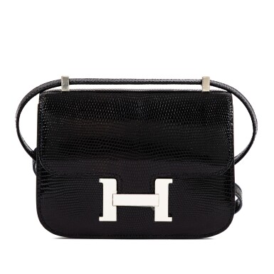 View full screen - View of Black Shiny Niloticus Lizard Micro Constance 14 Palladium Hardware, 2025.