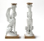 A PAIR OF PORCELAIN BISCUIT AND GILT-BRONZE SPHINXES CANDLESTICKS, ATTRIBUTED TO THE NAST FACTORY, PARIS, CIRCA 1805 | PAIRE DE FLAMBEAUX AUX SPHINX EN BISCUIT ET BRONZE DORÉ ATTRIBUÉE À LA MANUFACTURE NAST, PARIS, VERS 1805