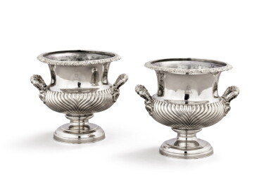 View full screen - View 1 of Lot 58. A pair of George IV English Sheffield silver-plated wine-coolers, engraved with crest, circa 1825.