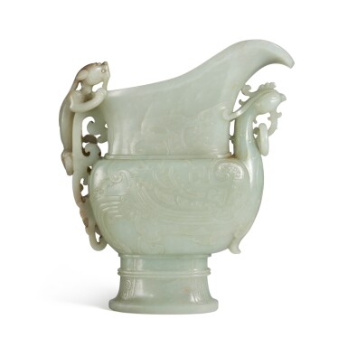 View full screen - View 1 of Lot 82. A large pale green jade archaistic phoenix-form vessel (Guang), Qing dynasty, Qianlong period | 清乾隆 青玉仿古鳳首螭龍紋觥.