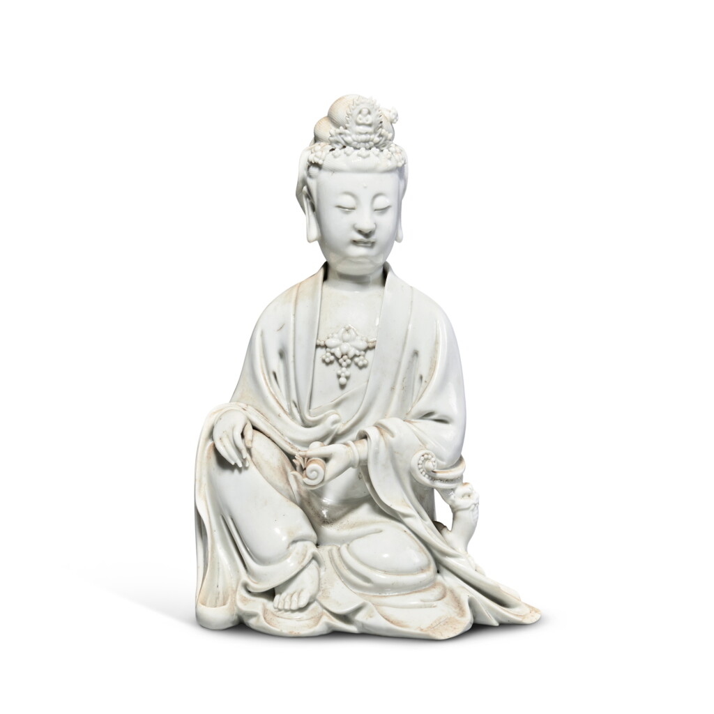 View full screen - View 1 of Lot 88. A 'Dehua' seated figure of Guanyin, 17th / 18th century .