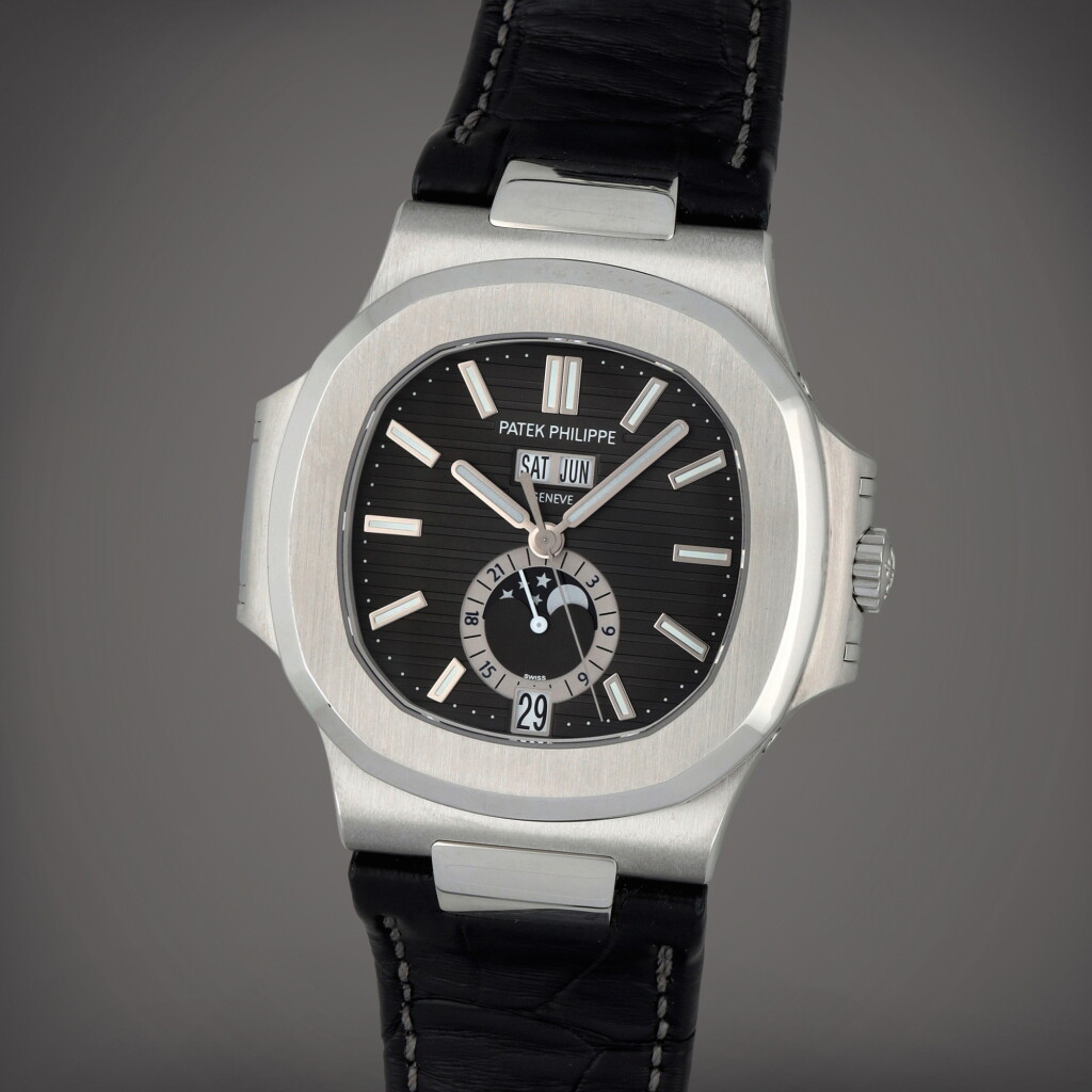 View full screen - View 1 of Lot 27. Nautilus, Reference 5726/1A-001 | A stainless steel annual calendar wristwatch with moon phases and 24-hour indication | Circa 2010 | 百達翡麗 | Nautilus 型號5726/1A-001 | 精鋼年曆腕錶備月相及24小時顯示,製作年份約2010.