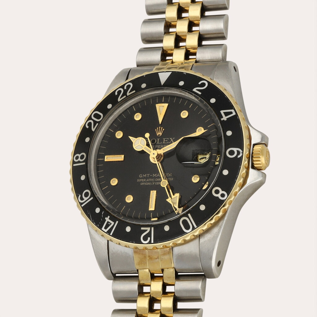 View full screen - View 1 of Lot 347. GMT-Master 'Nipple Dial', Reference 1675 | A stainless steel and yellow gold dual time zone wristwatch with date and bracelet | Circa 1979.