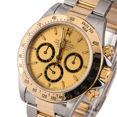 View full screen - View 1 of Lot 11. ROLEX | Daytona, Ref. 16523, A Stainless Steel and Yellow Gold Chronograph Wristwatch with Bracelet, Circa 1995 .