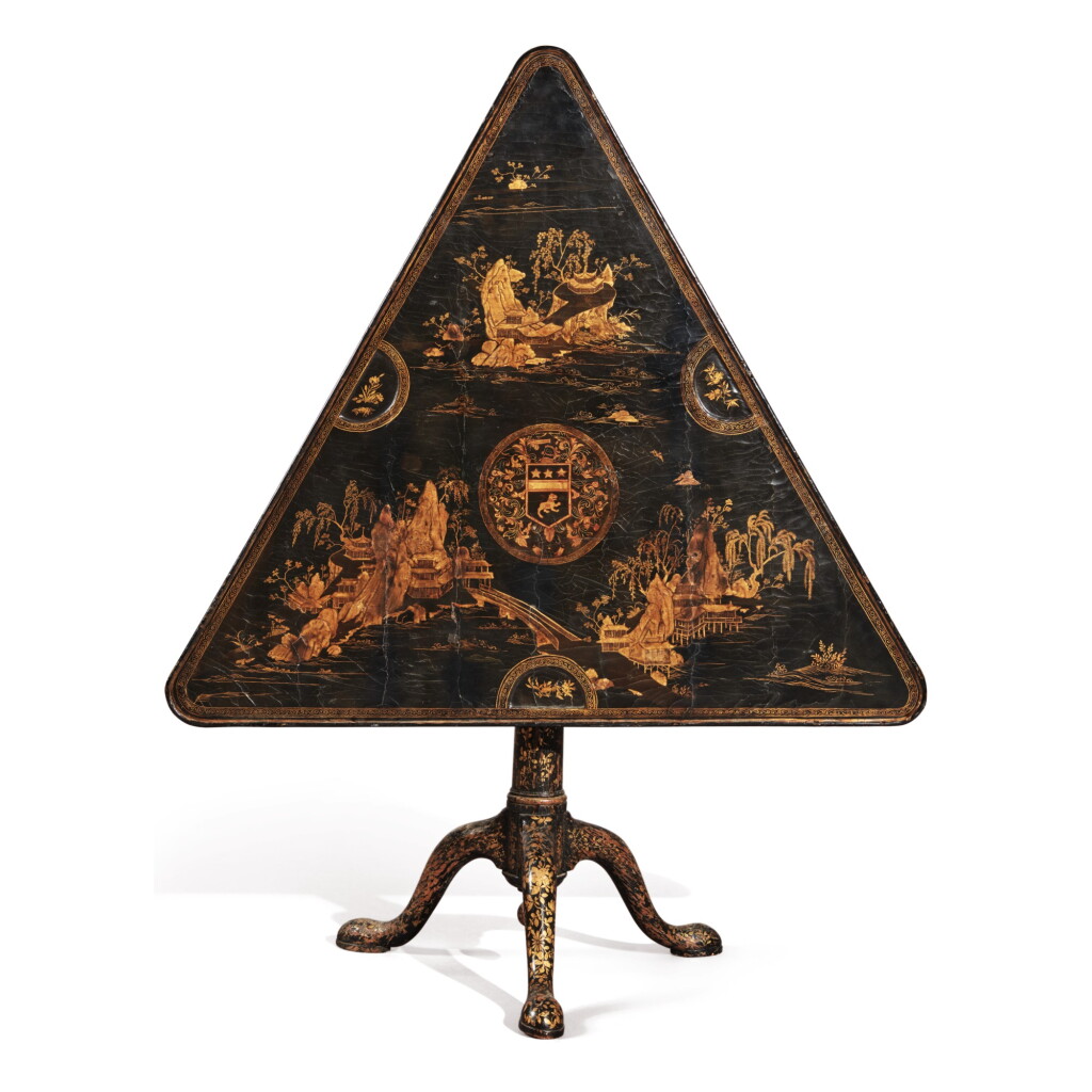 View full screen - View 1 of Lot 194. A CHINESE EXPORT BLACK AND GOLD LACQUERED TRIANGULAR TILT-TOP GAMES TABLE, CIRCA 1740.