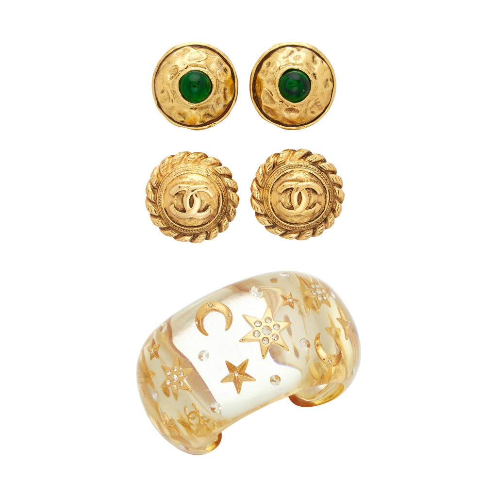 View full screen - View 1 of Lot 76. Set of Three Vintage Acrylic, Gold Plated Brass and Crystal Celestial Cuff, 1995, and Vintage Emerald Gripoix Glass and Gold Plated Brass Clip On Earrings, 1980s and Vintage Gold Plated Brass CC Clip On Earrings, 1980s .