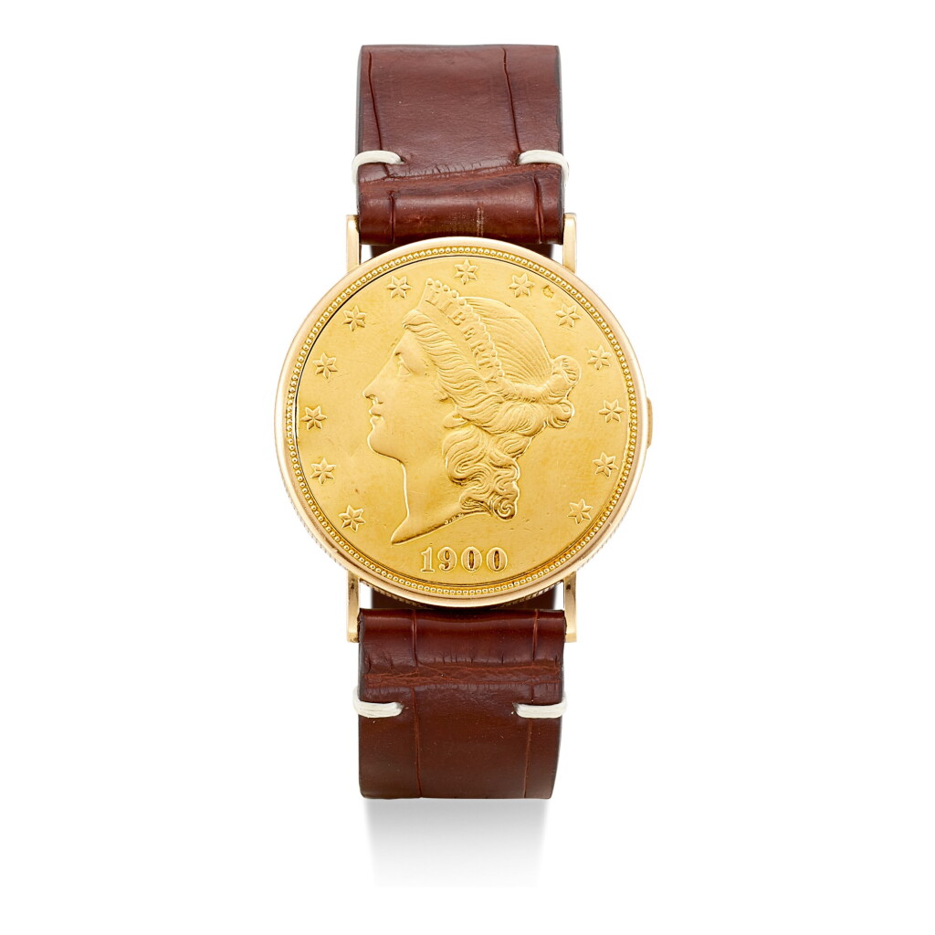 View full screen - View 1 of Lot 104. PIAGET | A YELLOW GOLD TWENTY DOLLAR COIN WATCH, CIRCA 1990.