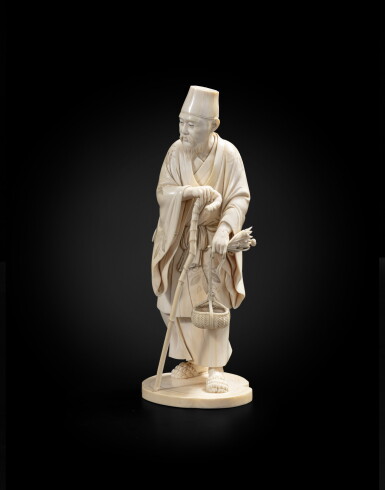 View full screen - View 1 of Lot 233. A Tokyo school ivory okimono of an old man carrying a basket Japan, Meiji period | 日本 明治時期 象牙雕人物立像.