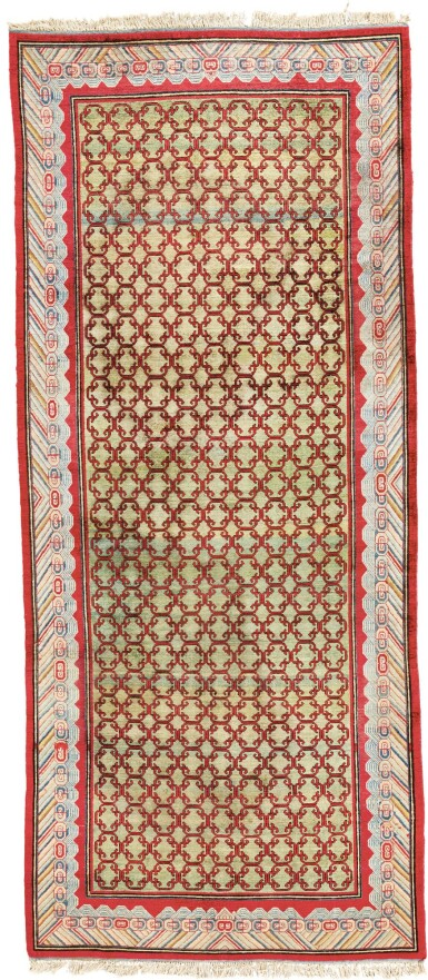 View full screen - View 1 of Lot 316. A SILK YARKHAND CARPET, EAST TURKESTAN.