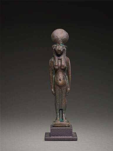 View full screen - View 1 of Lot 272. AN EGYPTIAN BRONZE FIGURE OF SEKHMET, 21ST/26TH DYNASTY, 1075-525 B.C..