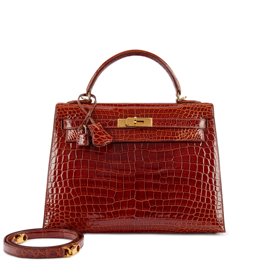 View full screen - View 1 of Lot 9801. Important Private Collection: Miel Shiny Porosus Crocodile Kelly 32 Sellier Gold Hardware, 2002.