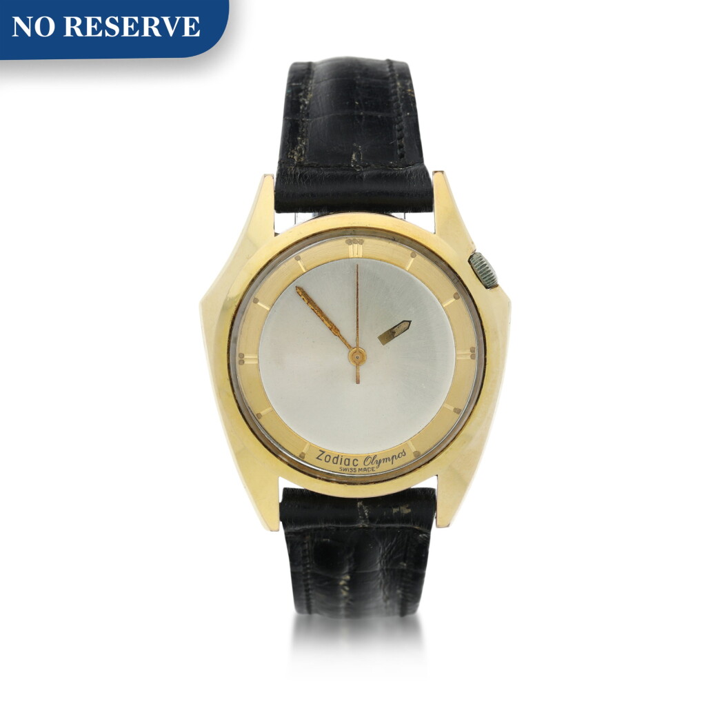 View full screen - View 1 of Lot 9. Olympos A gold plated and stainless steel automatic wristwatch with mystery dial, Circa 1965.