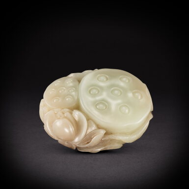 View full screen - View 1 of Lot 6889. A white and russet jade 'lotus' carving, Qing dynasty, 18th century | 清十八世紀 白玉雙連同心.