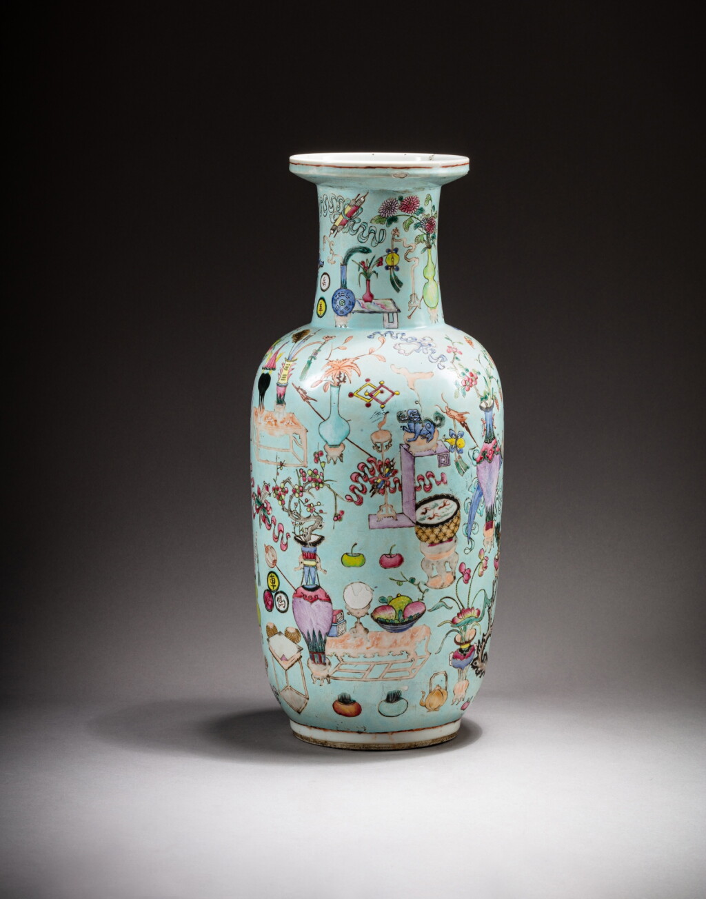 View full screen - View 1 of Lot 72. A turquoise-ground famille-rose 'Hundred Antiques' rouleau vase, Qing dynasty, 19th century | 清十九世紀 松石綠地粉彩博古圖棒槌瓶.