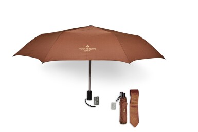 View full screen - View 1 of Lot 8182. A set of two folding umbrellas and silk tie, Circa 2015 and 2020 | 百達翡麗 | 一套兩把雨傘及領帶,約2015及2020年製.