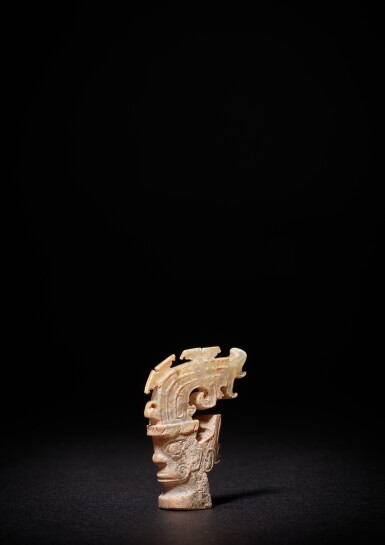 View full screen - View 1 of Lot 3607. An exceptionally rare jade 'mask' ornament, Shang dynasty or earlier | 商或較早 卷尾形高冠神人首玉飾.
