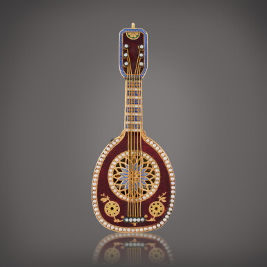 View full screen - View 1 of Lot 493. A yellow gold and enamel lute with music, Circa late 19th century and earlier.