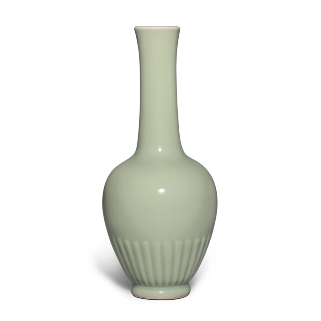 View full screen - View 1 of Lot 206. A rare celadon-glazed 'chrysanthemum' bottle vase, Mark and period of Kangxi | 清康熙 青釉菊瓣瓶 《大清康熙年製》款.