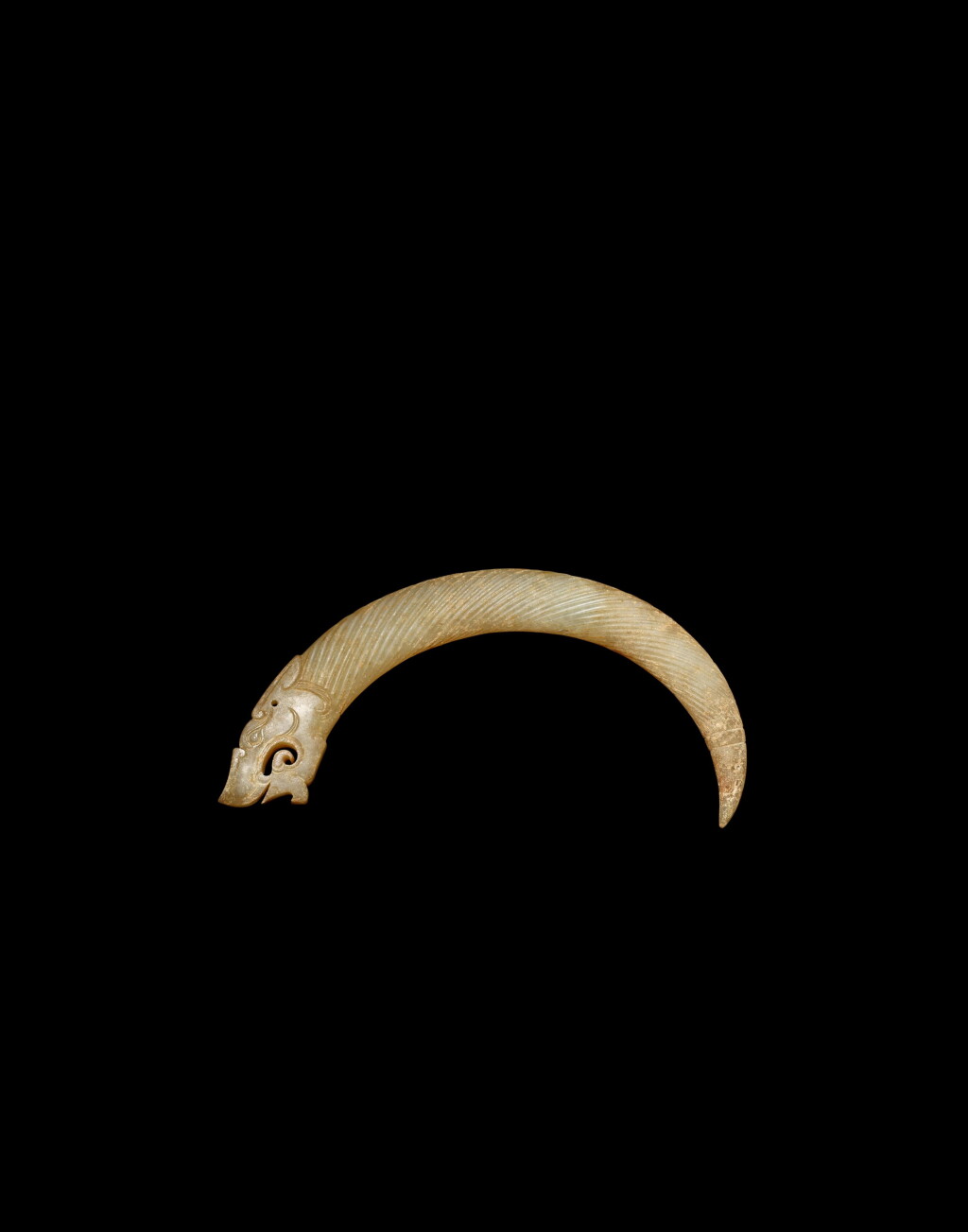 View full screen - View 1 of Lot 3755. A jade ‘dragon’ pendant, xi, Eastern Zhou dynasty, Warring States period | 東周戰國 玉龍首觿.
