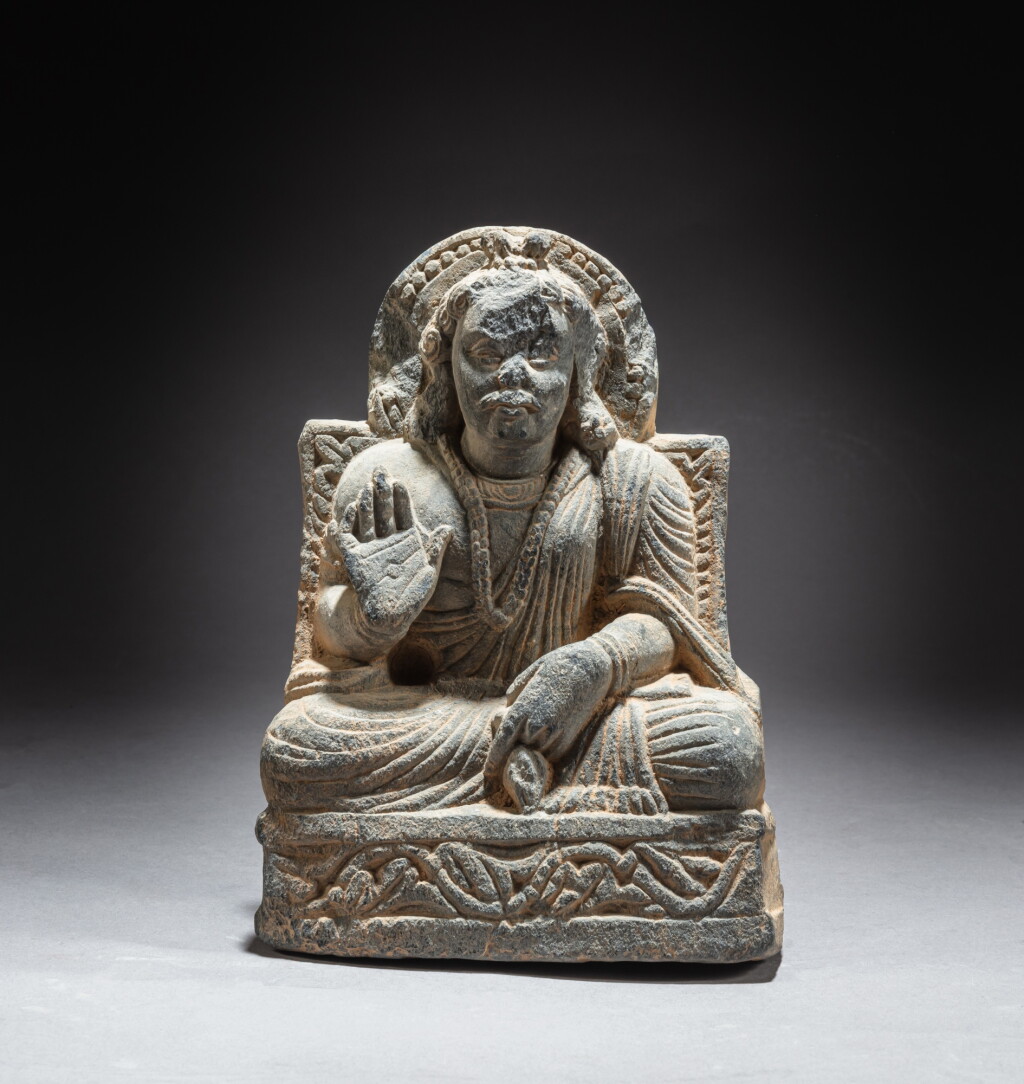 View full screen - View 1 of Lot 98. A gray schist figure of Maitreya, Ancient region of Gandhara, circa 2nd / 4th century | 犍陀羅 約二 / 四世紀 灰片岩雕彌勒佛坐像.