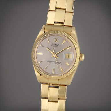 View full screen - View 1 of Lot 43. Reference 1503 Date | A yellow gold automatic wristwatch with date and bracelet, Circa 1967.
