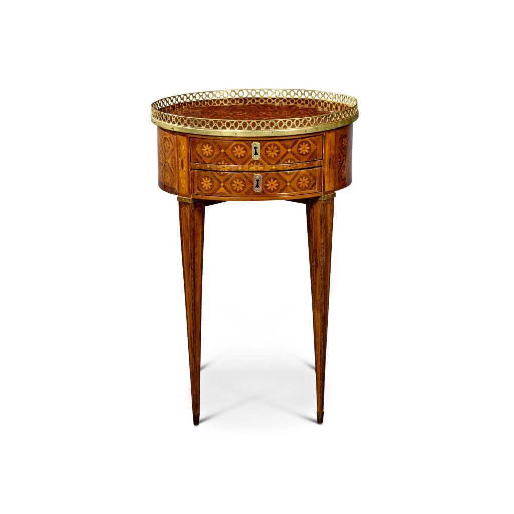 View full screen - View 1 of Lot 254. A Louis XVI Brass-Mounted Amaranth, Olivewood, and Mahogany Marquetry Table en Chiffonnière, Circa 1770.