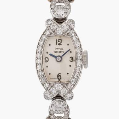 View full screen - View 1 of Lot 121. A platinum and diamond-set Art Deco bracelet watch, Movement made in 1939.