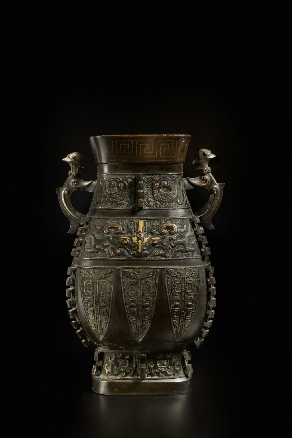 View full screen - View 1 of Lot 203. An archaistic parcel-gilt silver-inlaid bronze vessel (Hu), Qing dynasty, 18th century.
