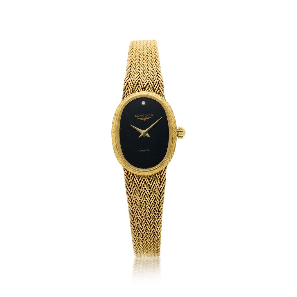 View full screen - View 1 of Lot 37. A LADY'S YELLOW GOLD BRACELET WATCH WITH ONYX AND DIAMOND-SET DIAL, CIRCA 1990.