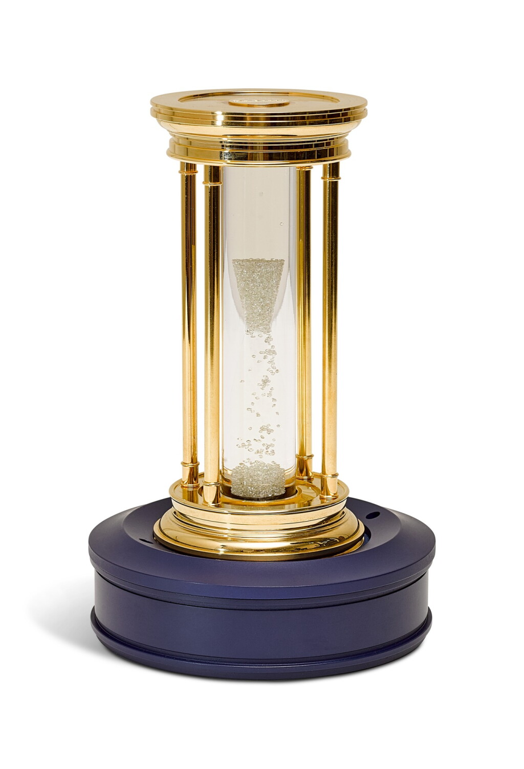 View full screen - View 1 of Lot 213. DE BEERS | A LIMITED EDIITON GOLD-PLATED HOURGLASS WITH FLOATING DIAMONDS, CIRCA 2000.