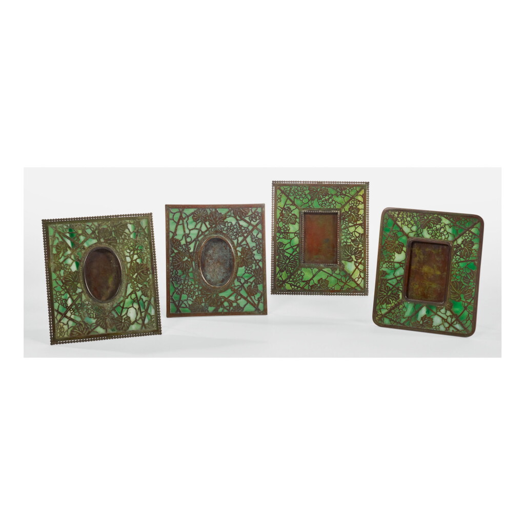 View full screen - View 1 of Lot 10. TIFFANY STUDIOS | FOUR "GRAPE VINE" PHOTOGRAPH FRAMES.
