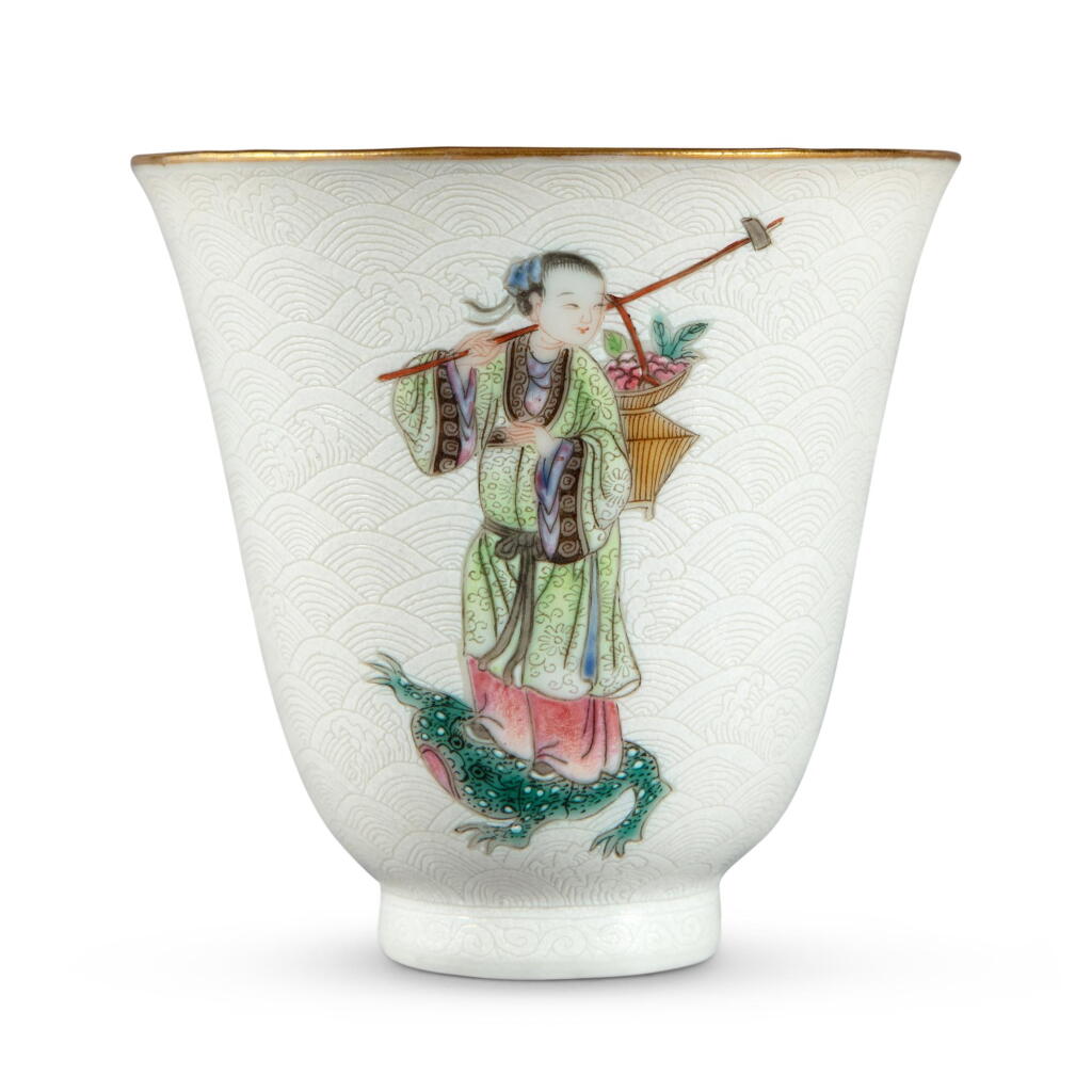 View full screen - View 1 of Lot 903. A sgraffiato-ground famille-rose 'immortal' wine cup, Qing dynasty, Daoguang period | 清道光 白地軋道粉彩仙人圖盃 《嶰竹主人造》款.