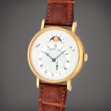 View full screen - View 1 of Lot 309. Classique Calendrier, Reference 7337 | A yellow gold wristwatch with day, date and moon phases | Circa 2011.