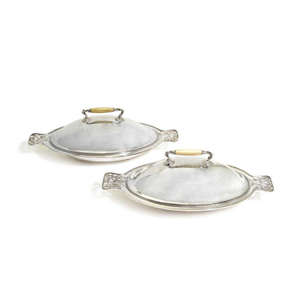 View full screen - View 1 of Lot 21. A PAIR OR GUILD OF HANDICRAFT SILVER-PLATED COPPER VEGETABLE DISHES AND COVERS, DESIGNED BY C. R. ASHBEE, CIRCA 1900.