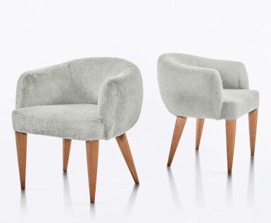 View full screen - View 1 of Lot 557. Pair of "Boule" Armchairs.