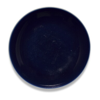 View full screen - View 1 of Lot 141. A blue-glazed dish Seal mark and period of Daoguang | 清道光 藍釉盤 《大清道光年製》款.
