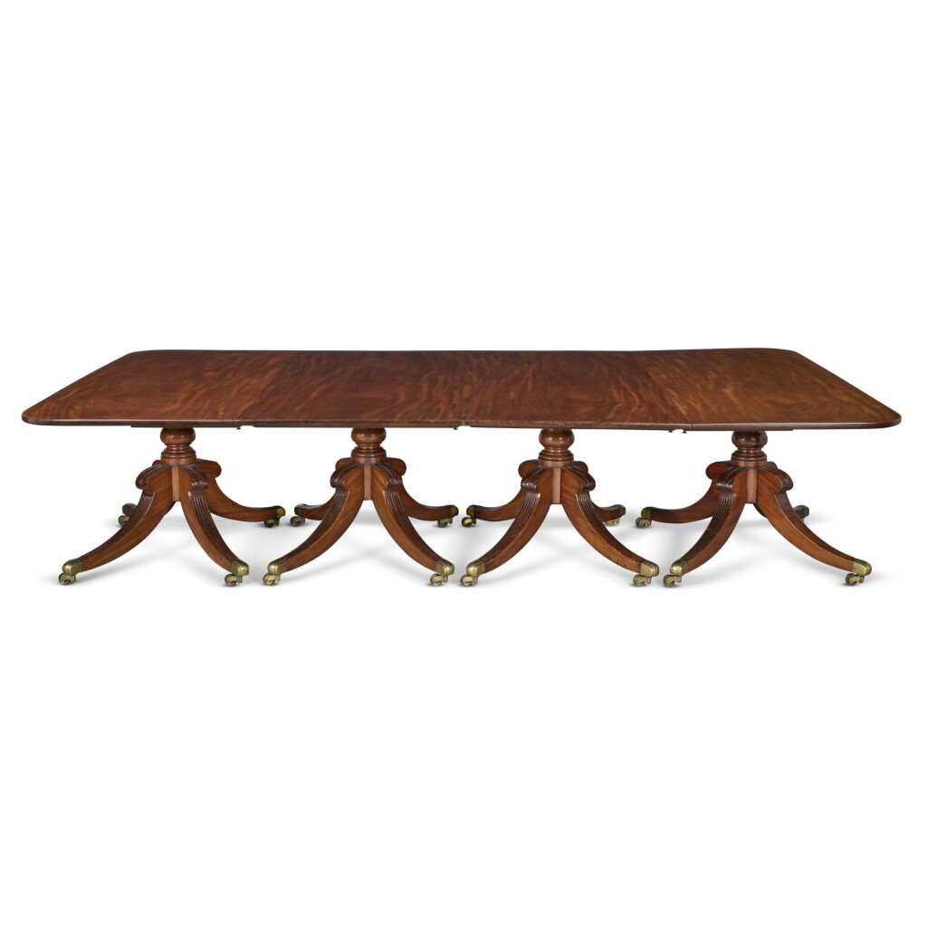 View full screen - View 1 of Lot 101. A Regency Mahogany Four-Pedestal Dining Table, Early 19th Century.