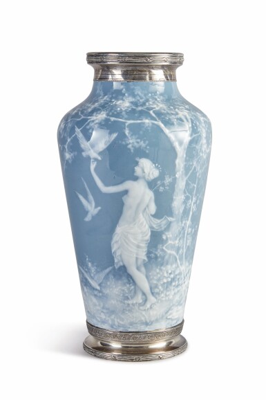 View full screen - View 1 of Lot 339. A LIMOGE PÂTE-SUR-PÂTE BLUE-GROUND VASE AND A LIMOGE PÂTE-SUR-PÂTE DARK-GREEN-GROUND ROUNDEL, CIRCA 1895.